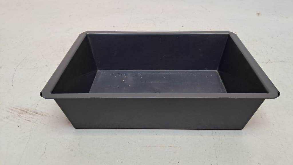 Original VW Staubox unter der 3er-Sitzbank in der 2. Sitzreihe für VW California-Occasion